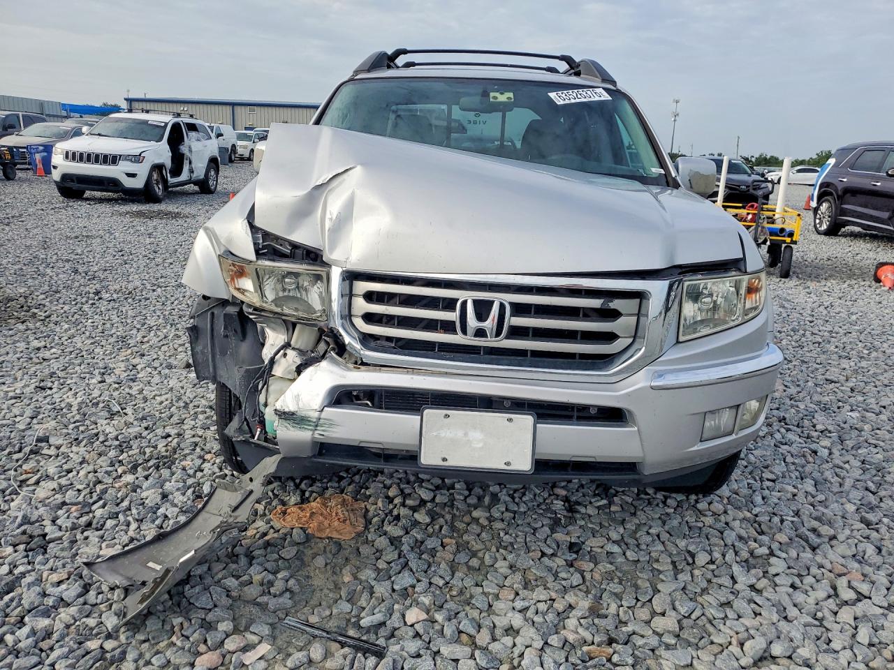 5FPYK1F55EB006771 · 2014 HONDA RIDGELINE · 5/12