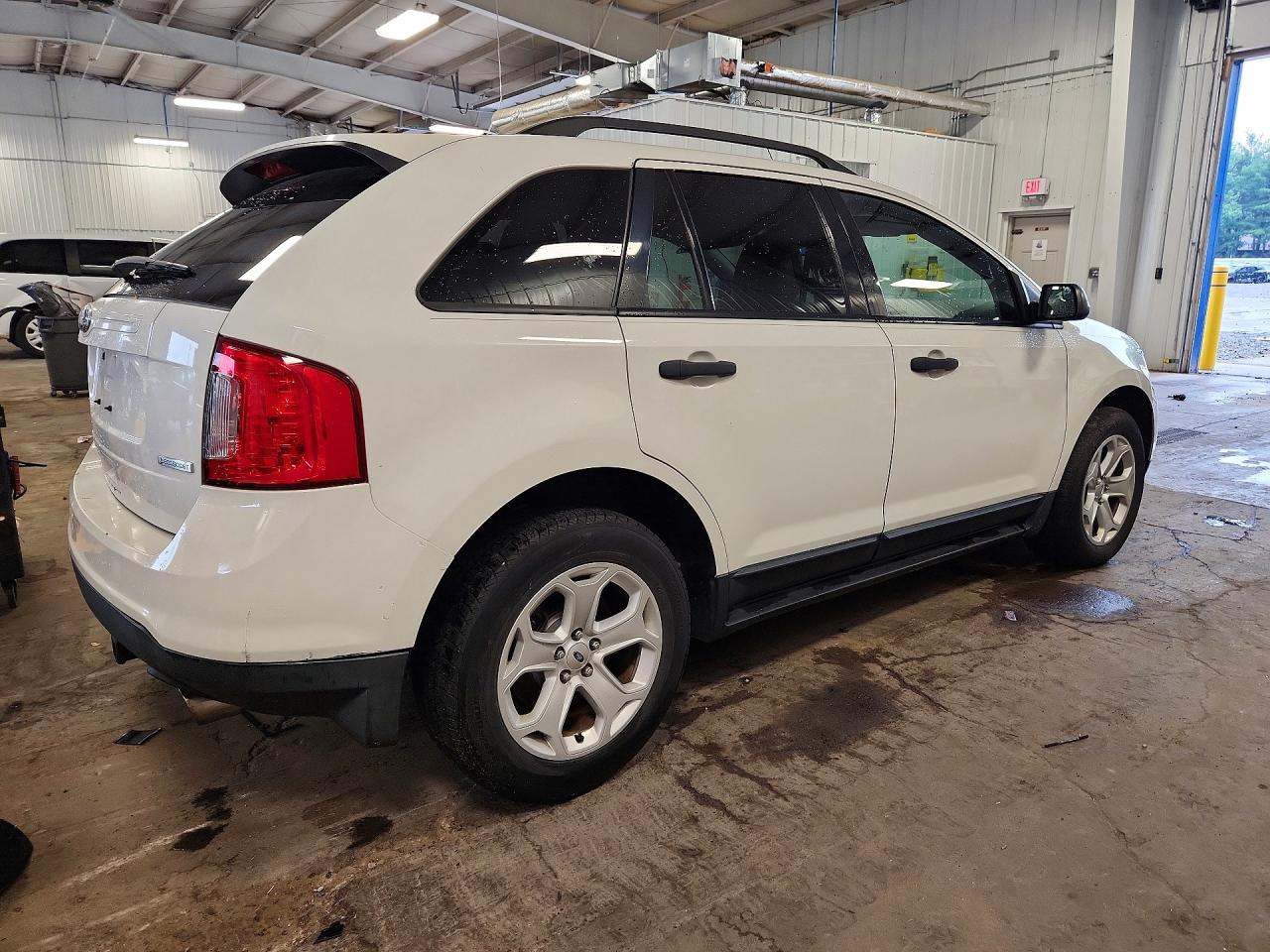 2FMDK3G92DBC22749 · 2013 FORD EDGE · 3/14