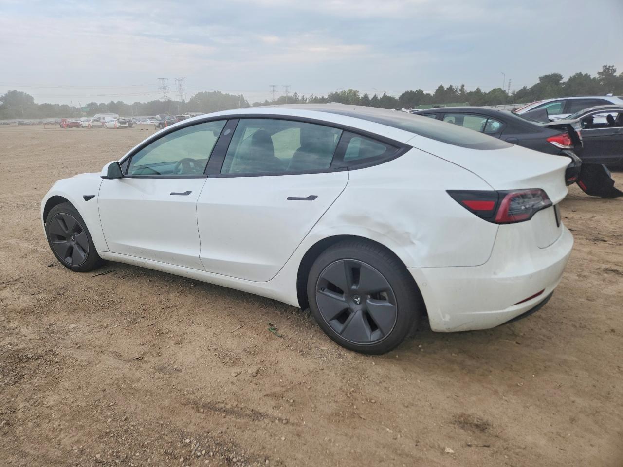 5YJ3E1EA3MF866594 · 2021 TESLA MODEL 3 · 2/12