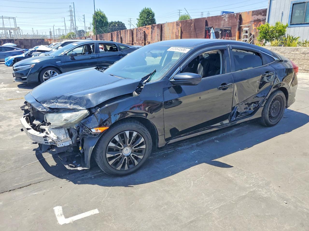 2HGFC2F53HH574438 · 2017 HONDA CIVIC