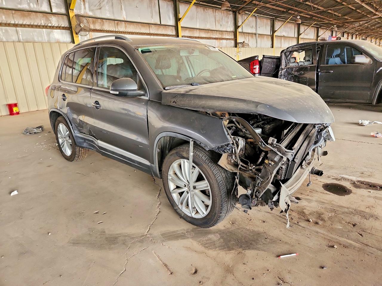WVGAV7AX8CW006023 · 2012 VOLKSWAGEN TIGUAN · 4/13