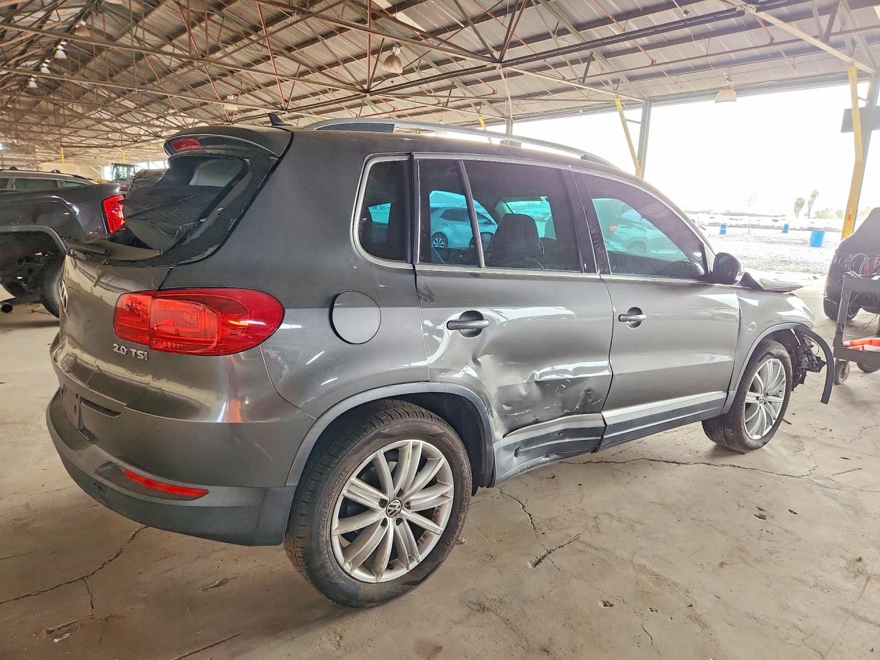 WVGAV7AX8CW006023 · 2012 VOLKSWAGEN TIGUAN · 3/13