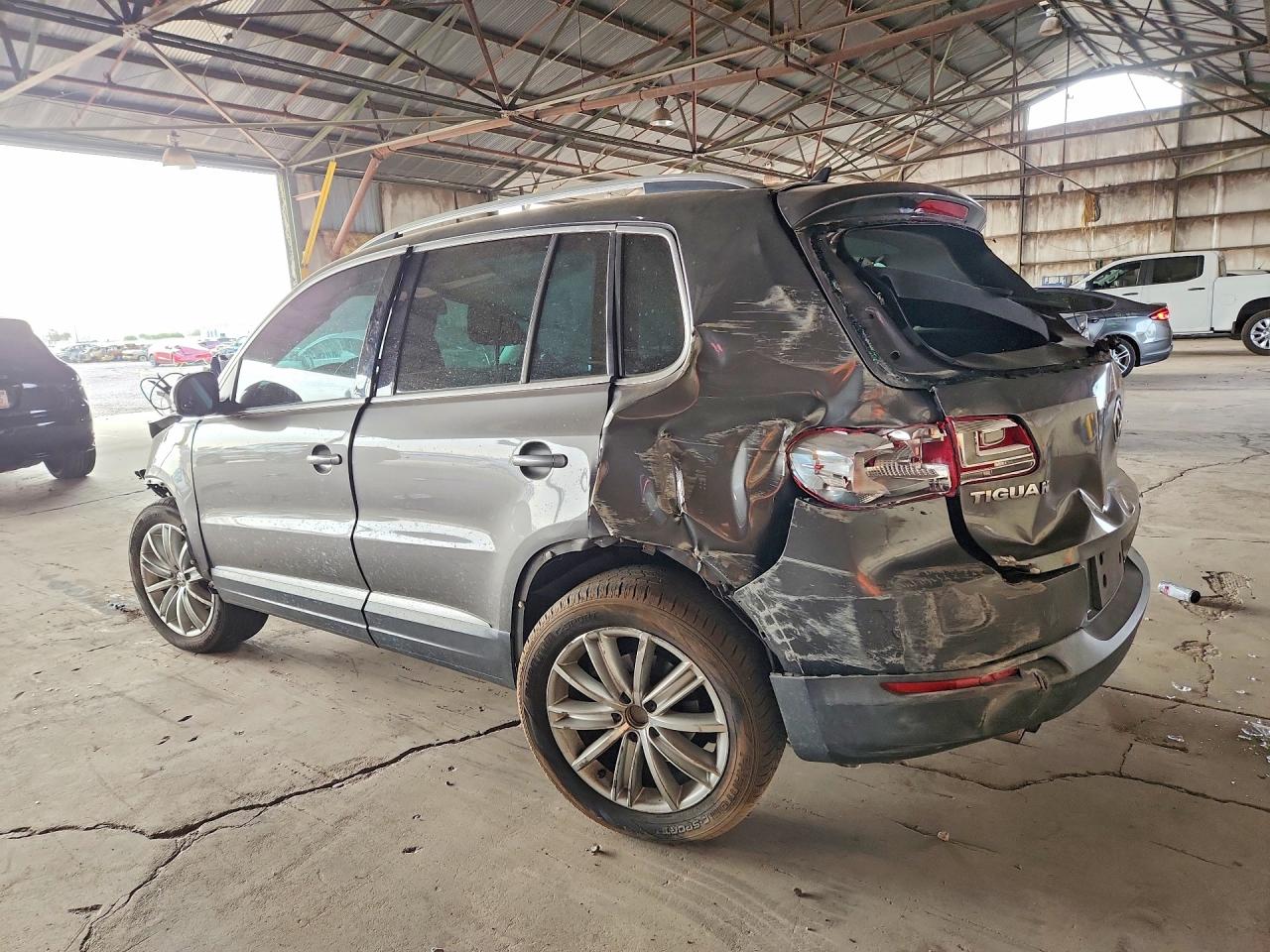 WVGAV7AX8CW006023 · 2012 VOLKSWAGEN TIGUAN · 2/13