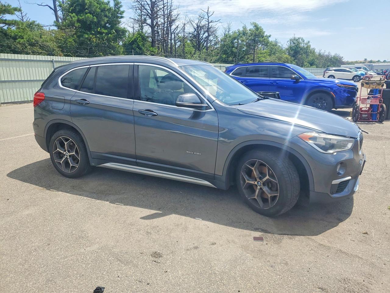 WBXHT3C38G5E53254 · 2016 BMW X1 · 4/13