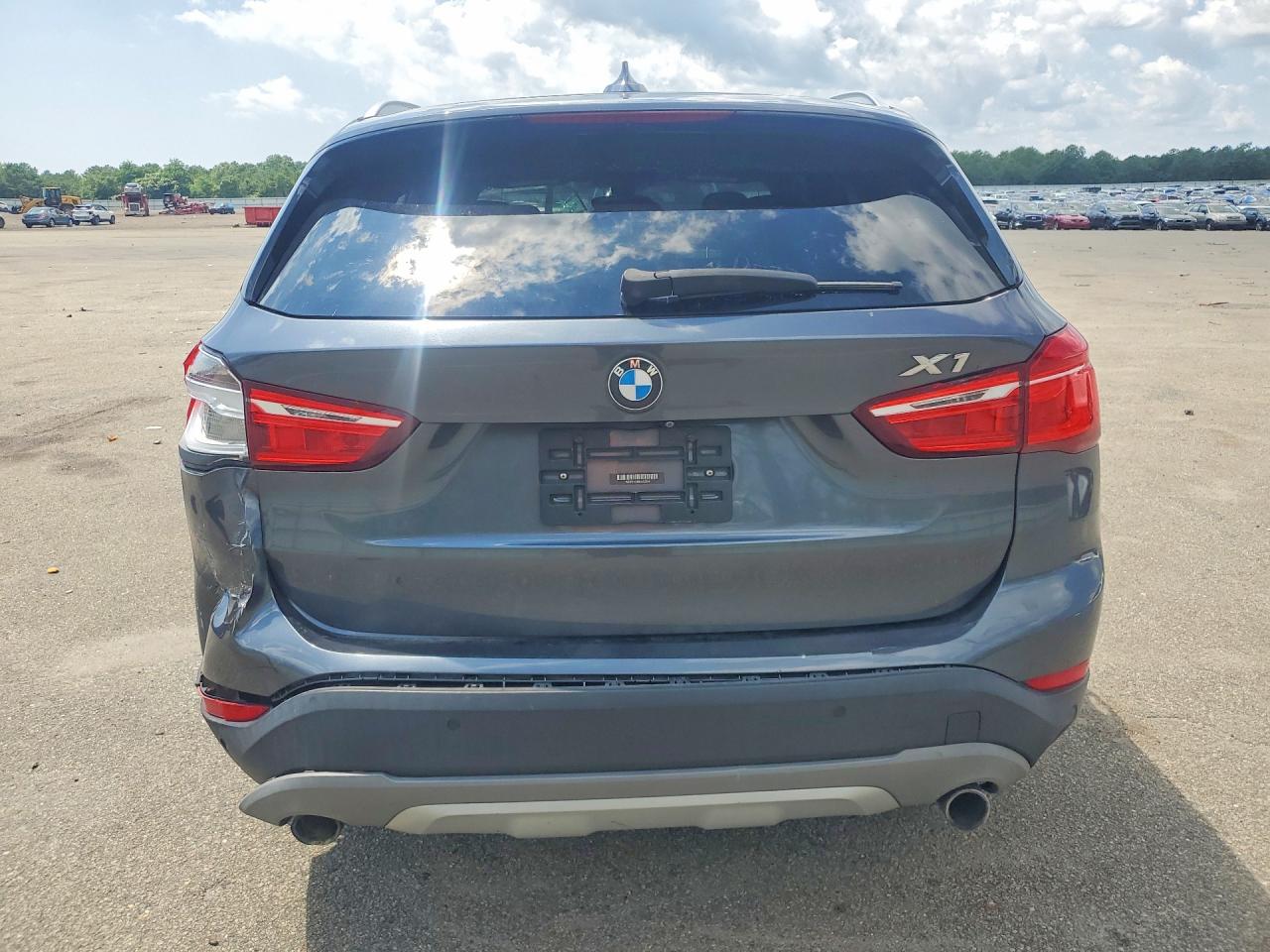 WBXHT3C38G5E53254 · 2016 BMW X1 · 6/13