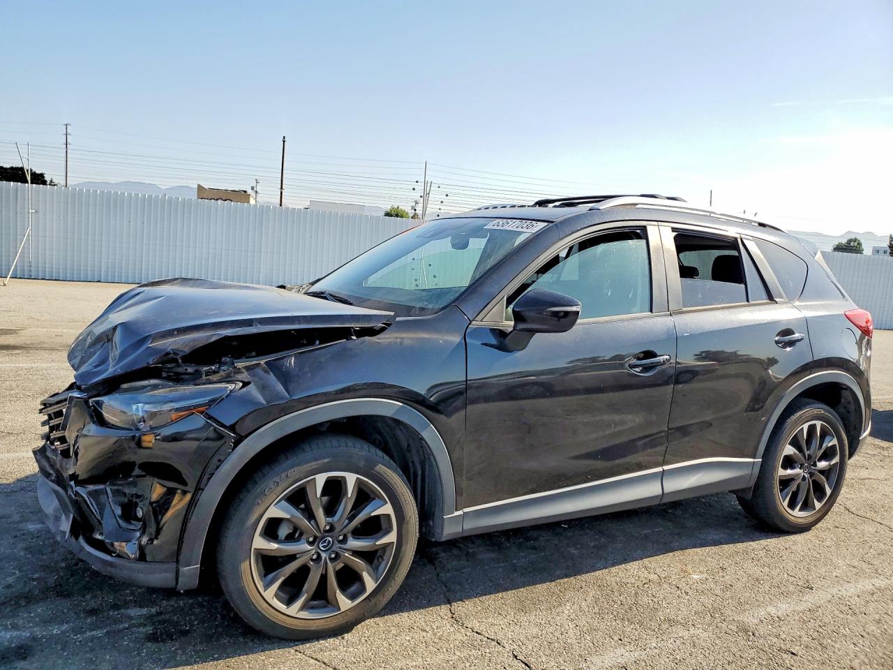 JM3KE2DY9G0673411 · 2016 MAZDA CX-5