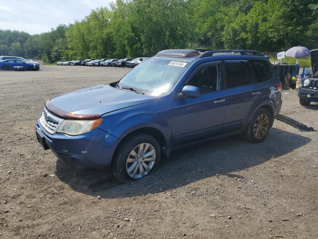 JF2SHADC0BH731142 · 2011 SUBARU FORESTER