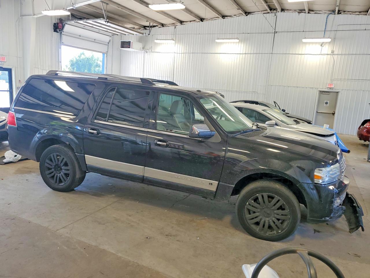 5LMJJ3J55BEJ00851 · 2011 LINCOLN NAVIGATOR · 4/13