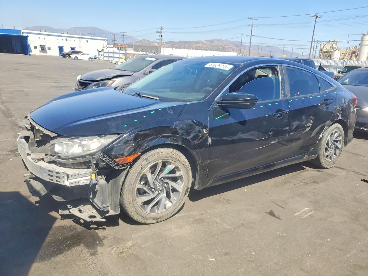 2HGFC2F77HH562309 · 2017 HONDA CIVIC