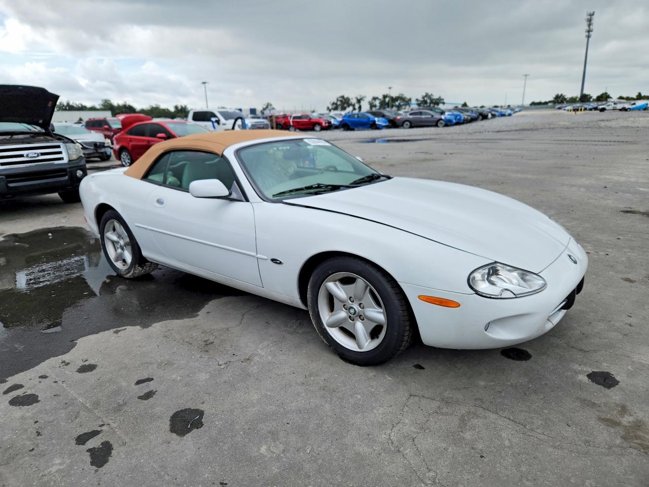 SAJGX2042XC042723 · 1999 JAGUAR XK8 · 4/12