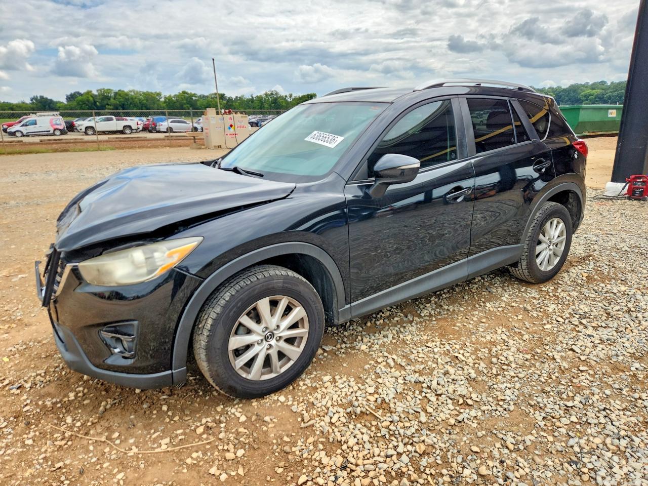 JM3KE2CYXG0789959 · 2016 MAZDA CX-5