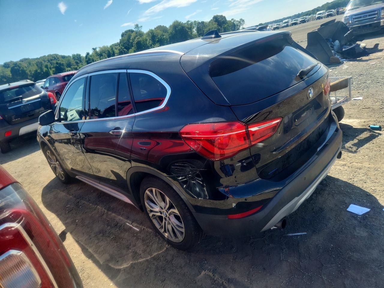 WBXHT3Z39G4A48839 · 2016 BMW X1 · 2/13