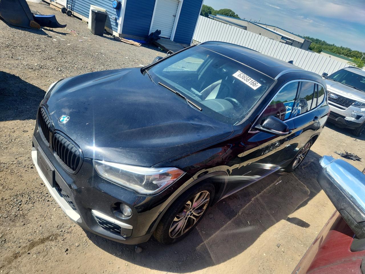 WBXHT3Z39G4A48839 · 2016 BMW X1