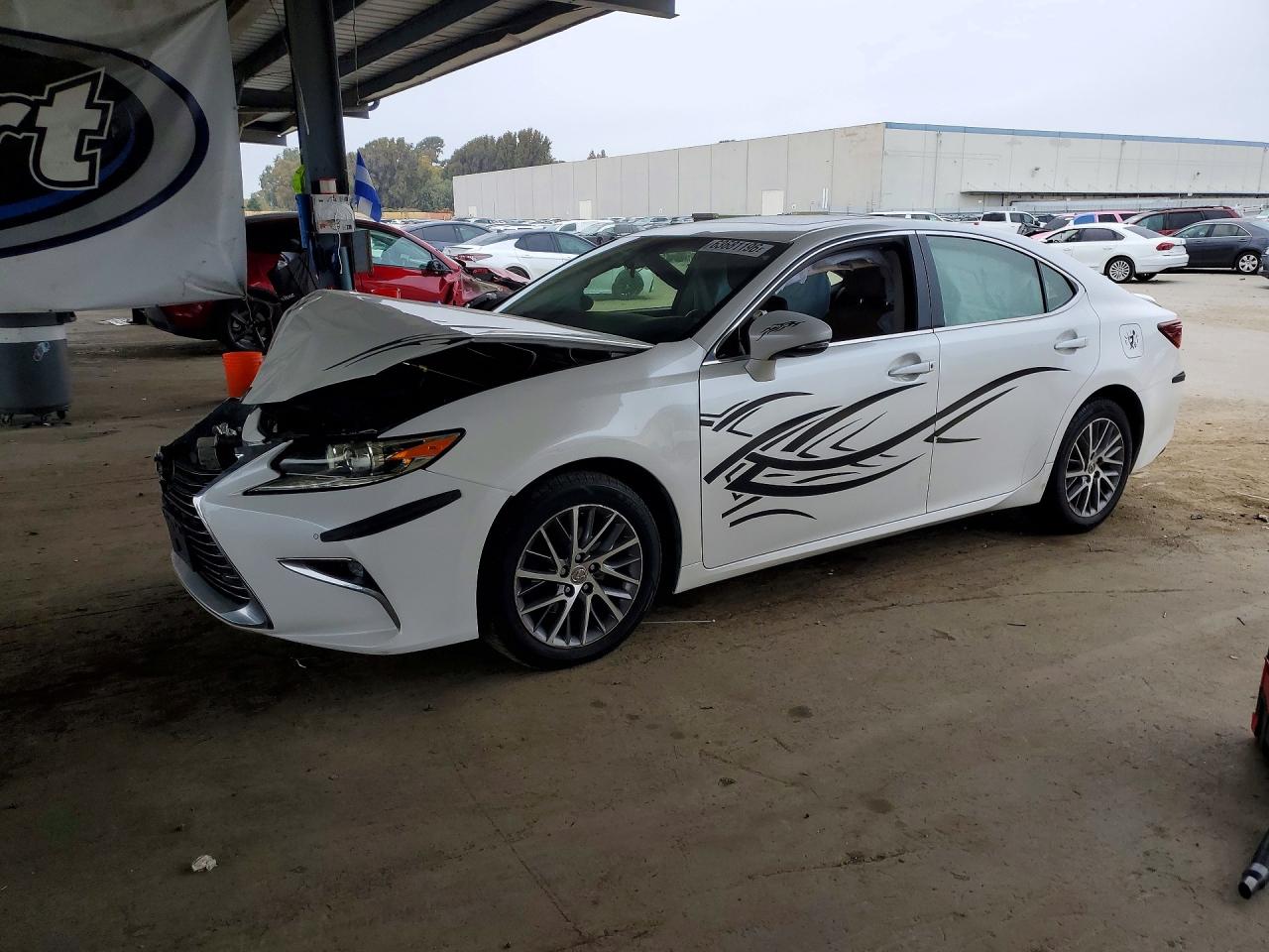 JTHBK1GG4G2231217 · 2016 LEXUS ES
