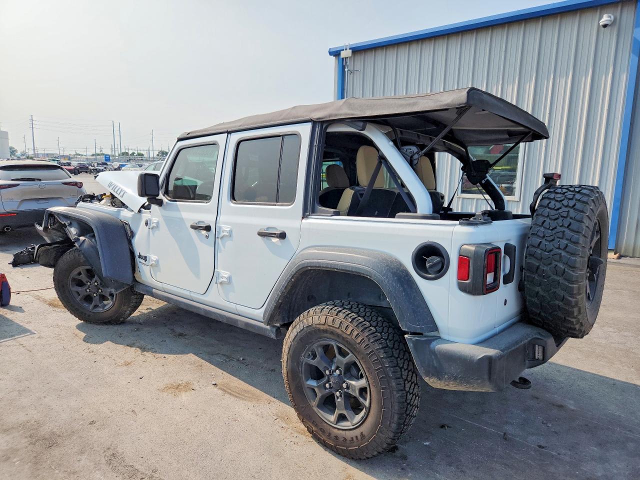 1C4HJXDG5MW803406 · 2021 JEEP WRANGLER UNLIMITED · 2/13