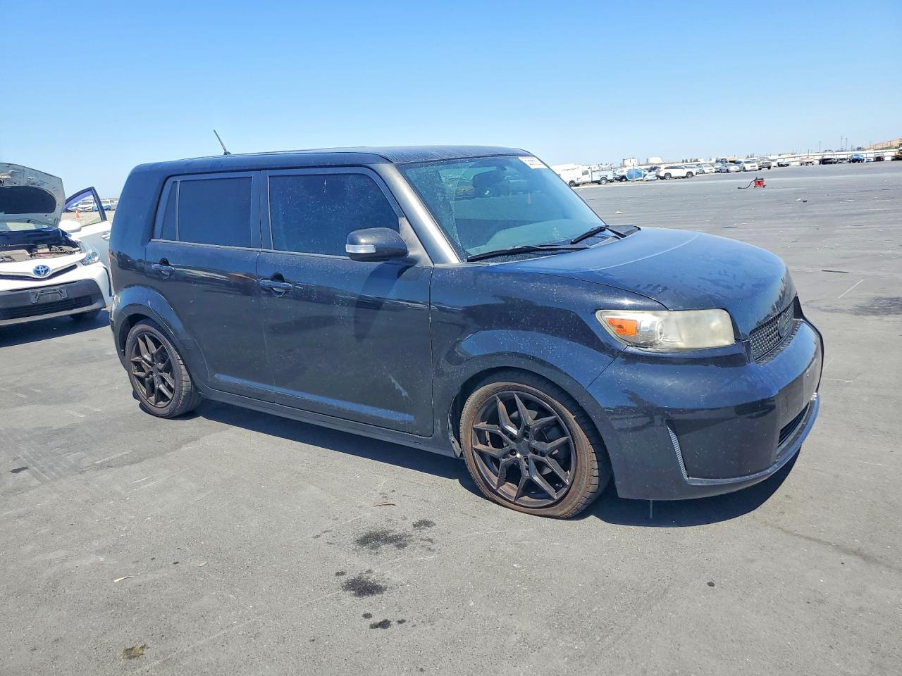JTLKE50E781013051 · 2008 TOYOTA SCION · 4/13