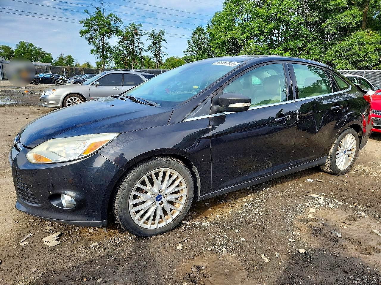 1FAHP3H21CL413933 · 2012 FORD FOCUS