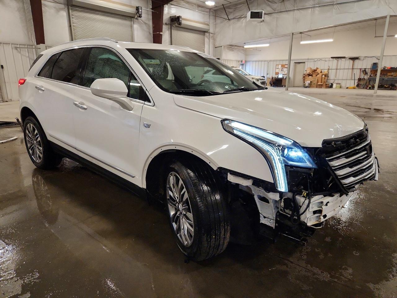 1GYKNERS9HZ130744 · 2017 CADILLAC XT5 · 4/14