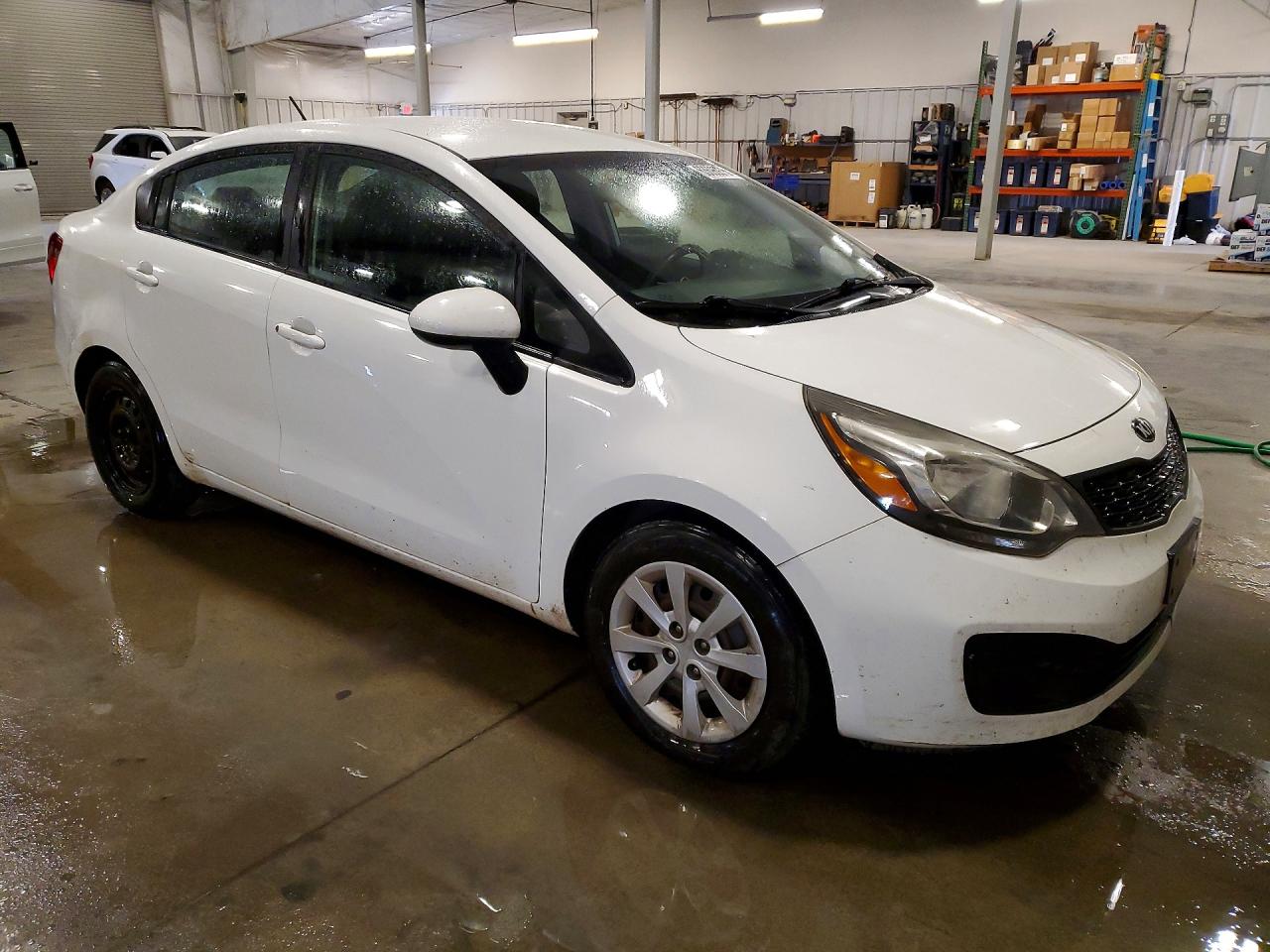 KNADM4A35D6241249 · 2013 KIA RIO · 4/12