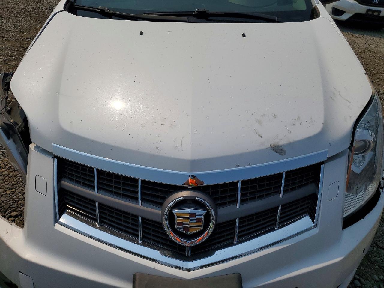 3GYFNBE36CS516347 · 2012 CADILLAC SRX · 12/14