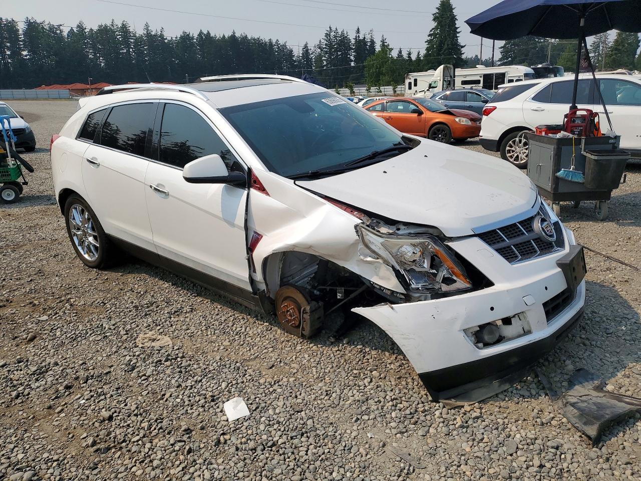 3GYFNBE36CS516347 · 2012 CADILLAC SRX · 4/14