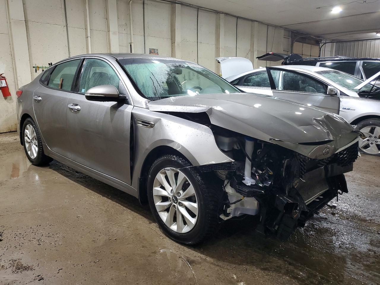 5XXGU4L38GG053067 · 2016 KIA OPTIMA · 4/13