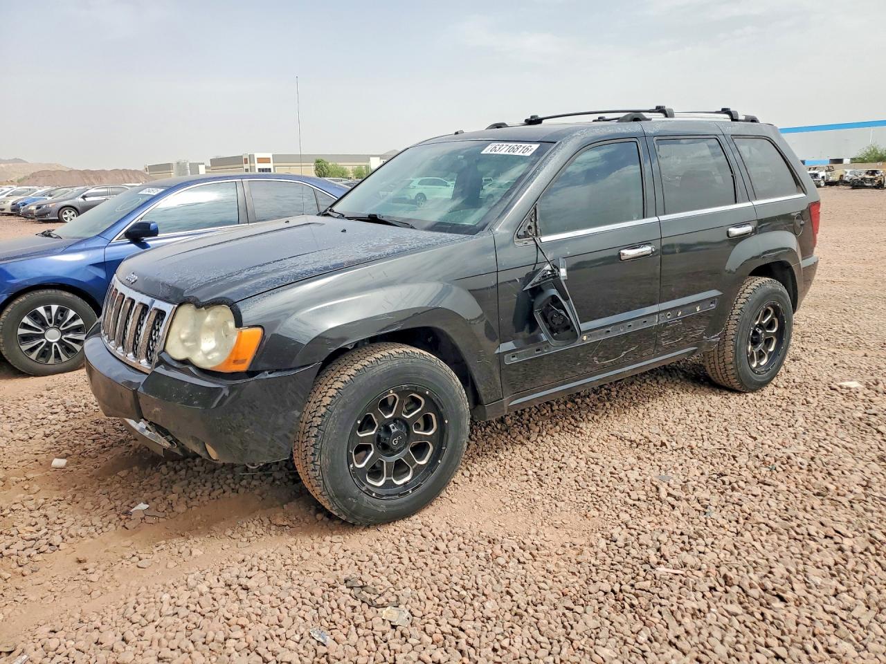 1J8HS68T99C554494 · 2009 JEEP GRAND CHEROKEE