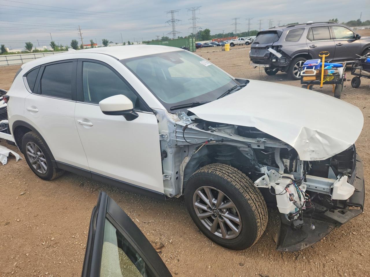 JM3KFBBM8N0528922 · 2022 MAZDA CX-5 · 4/14