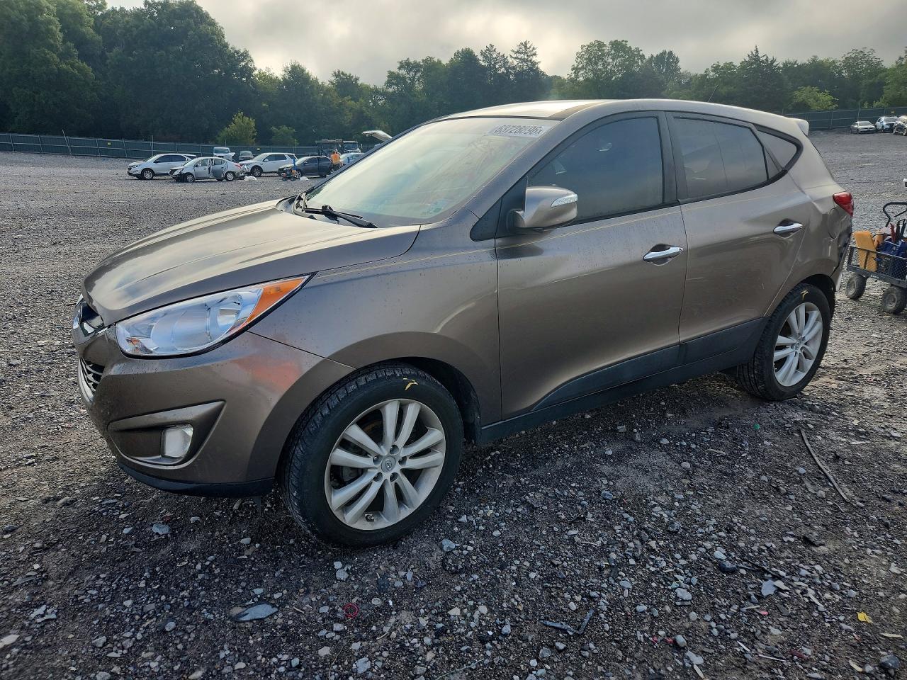 KM8JU3AC4BU153765 · 2011 HYUNDAI TUCSON