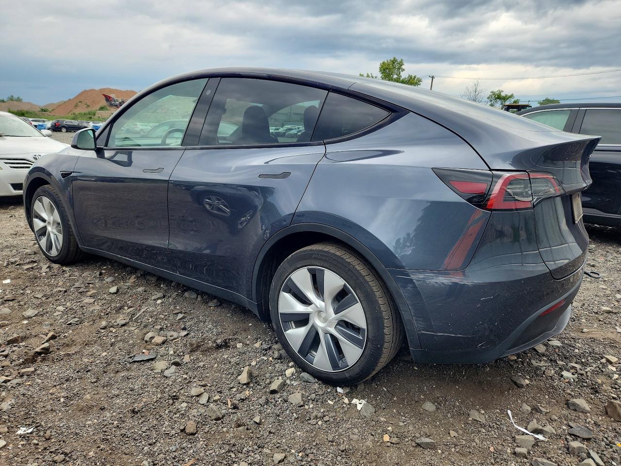7SAYGDEE8PA036377 · 2023 TESLA MODEL Y · 2/13