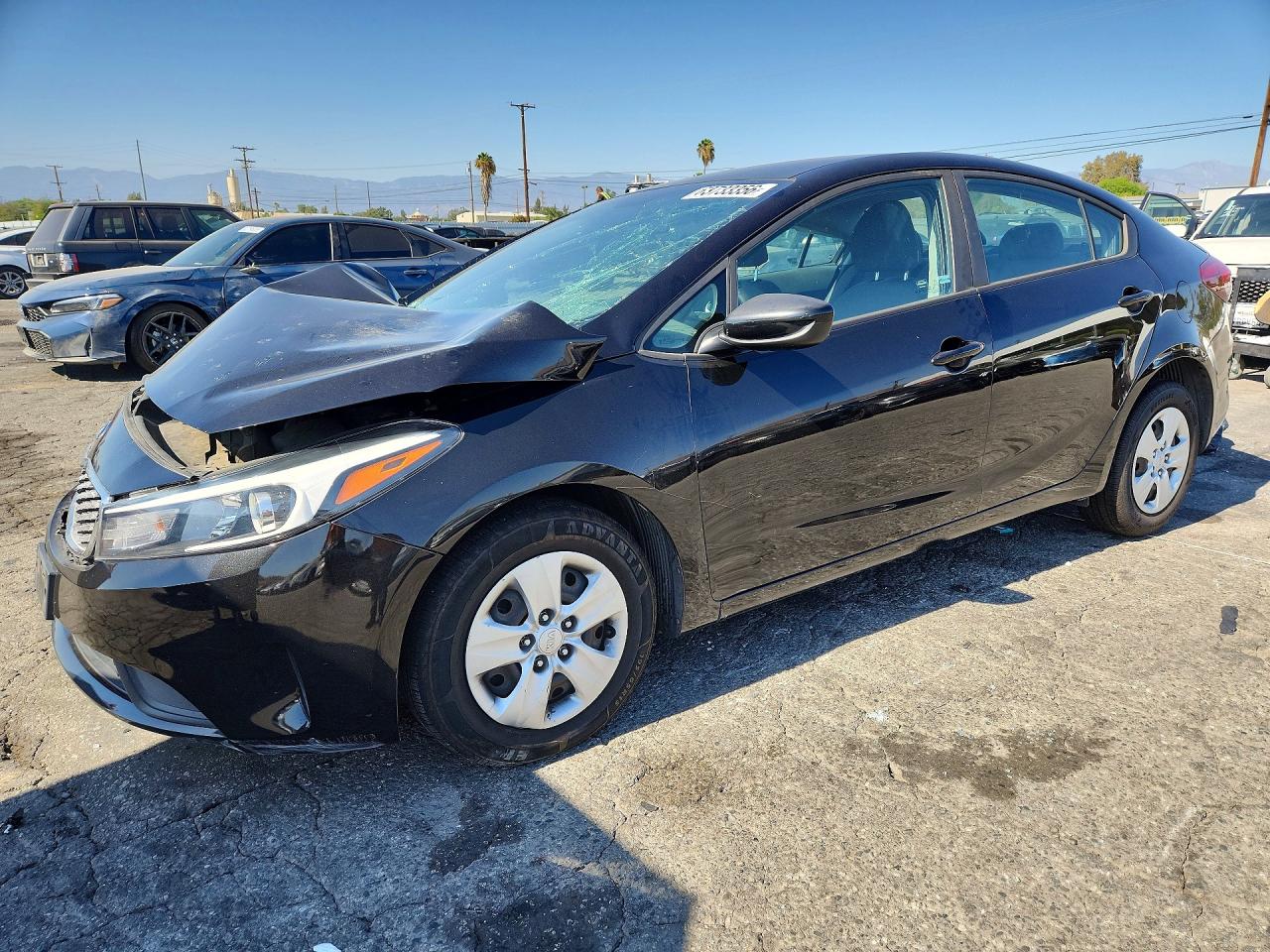 3KPFK4A72JE242305 · 2018 KIA FORTE