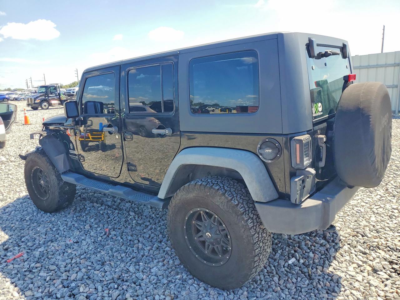1J4BA3H15BL591720 · 2011 JEEP WRANGLER UNLIMITED · 2/13