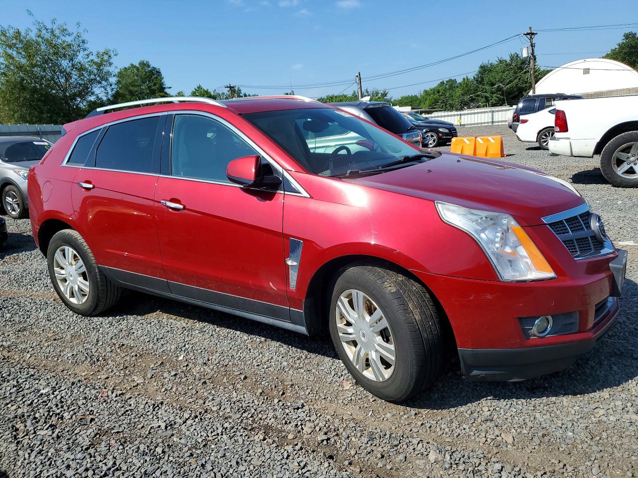 3GYFNDE30CS560761 · 2012 CADILLAC SRX · 4/13