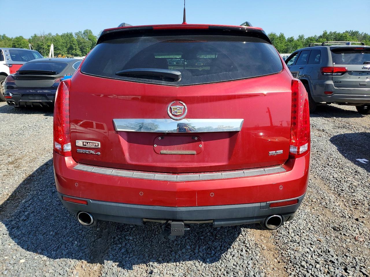 3GYFNDE30CS560761 · 2012 CADILLAC SRX · 6/13