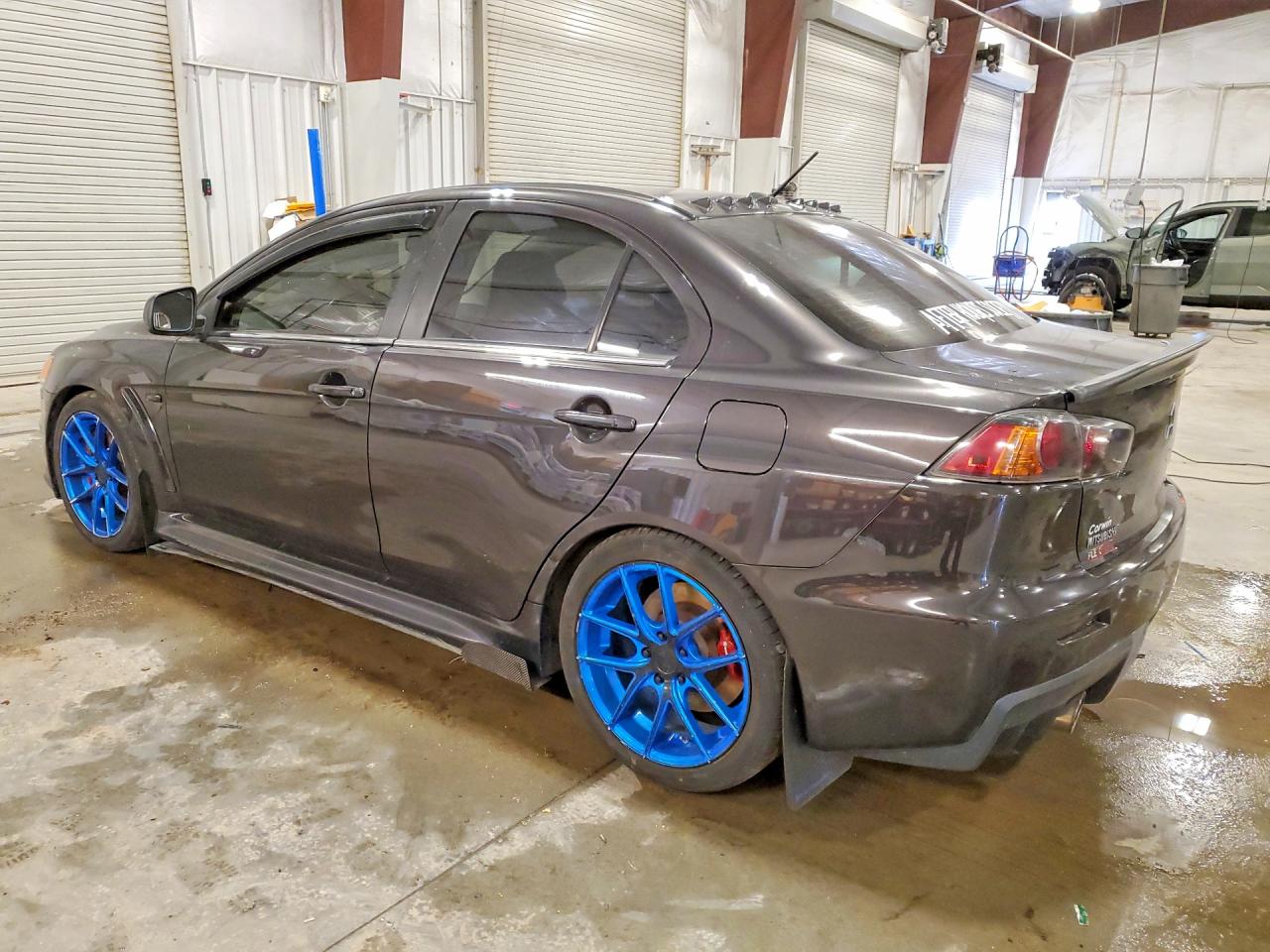 JA32W5FV6BU011084 · 2011 MITSUBISHI LANCER · 2/12