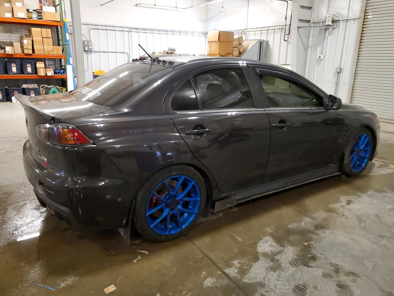 JA32W5FV6BU011084 · 2011 MITSUBISHI LANCER · 3/12