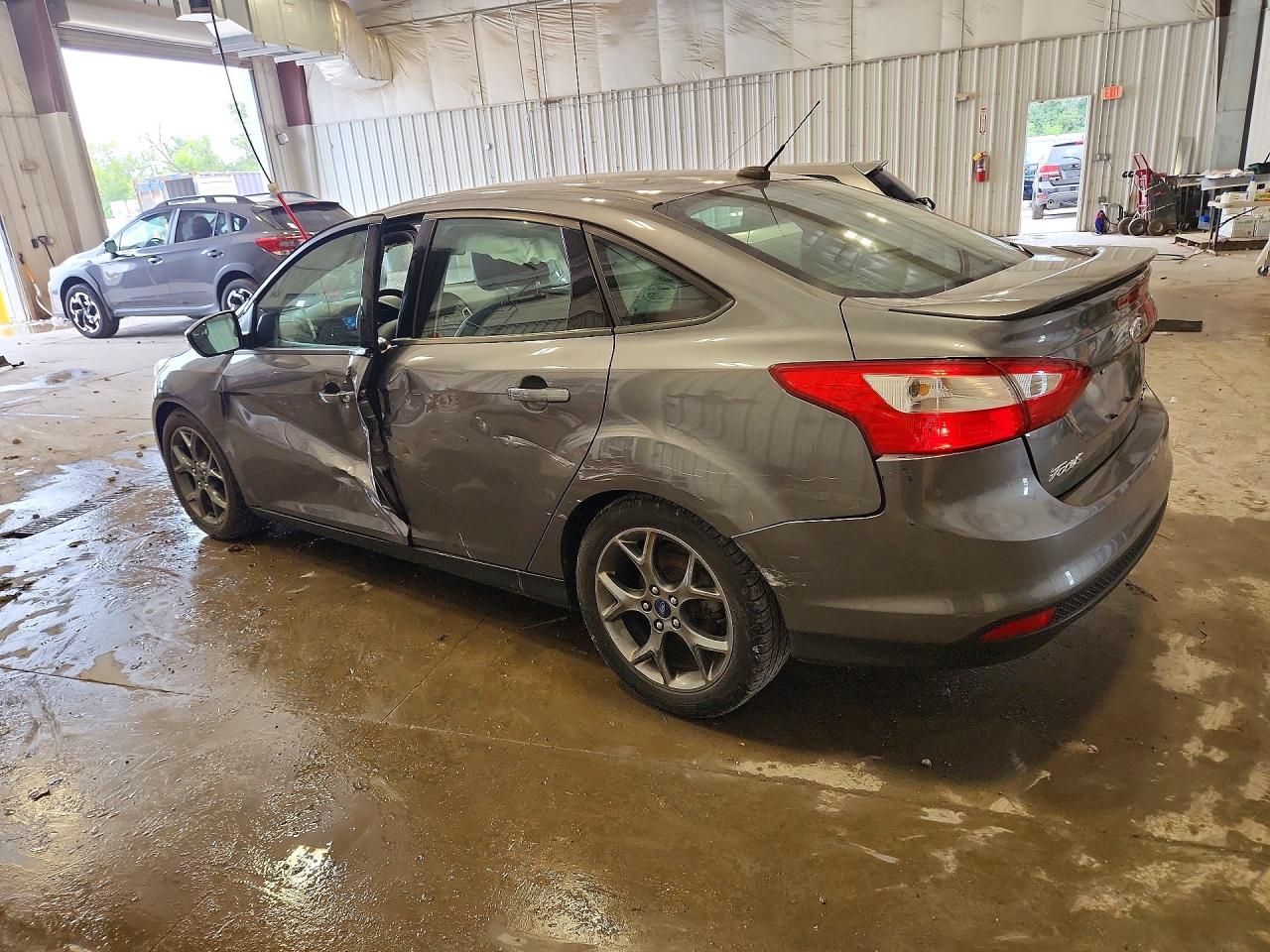 1FADP3F29EL194675 · 2014 FORD FOCUS · 2/12