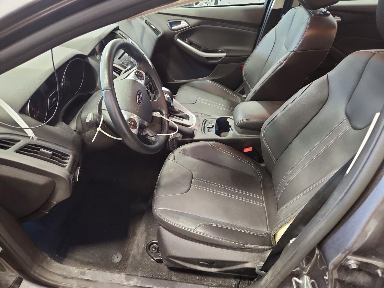 1FADP3F29EL194675 · 2014 FORD FOCUS · 7/12