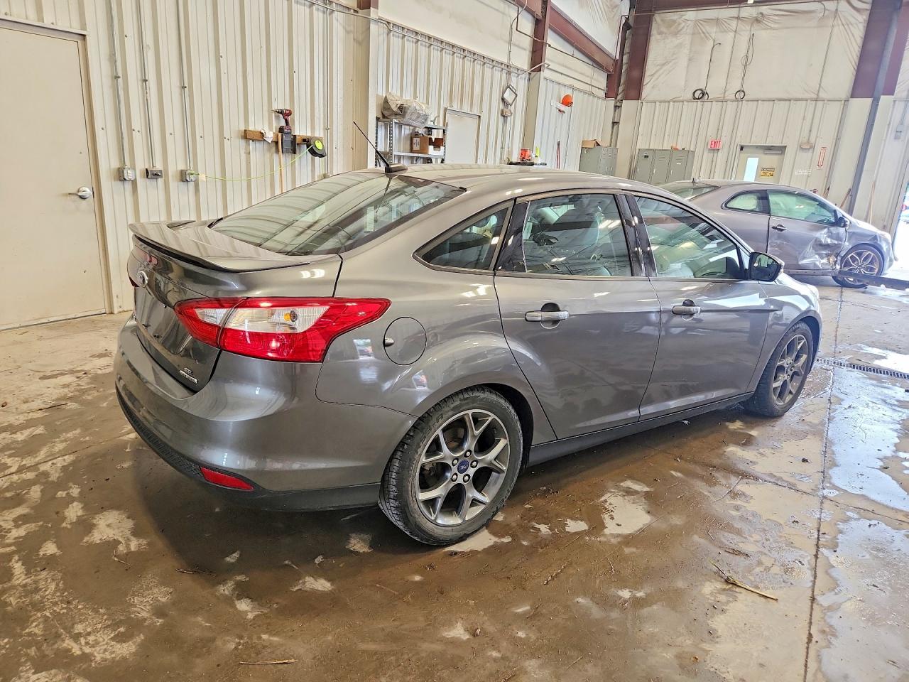 1FADP3F29EL194675 · 2014 FORD FOCUS · 3/12