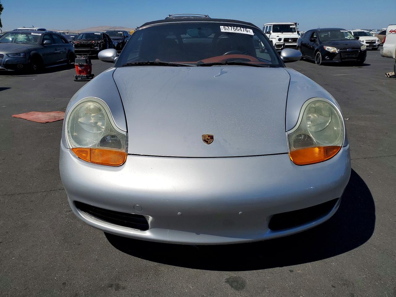 WP0CA2982XU629485 · 1999 PORSCHE BOXSTER · 5/12