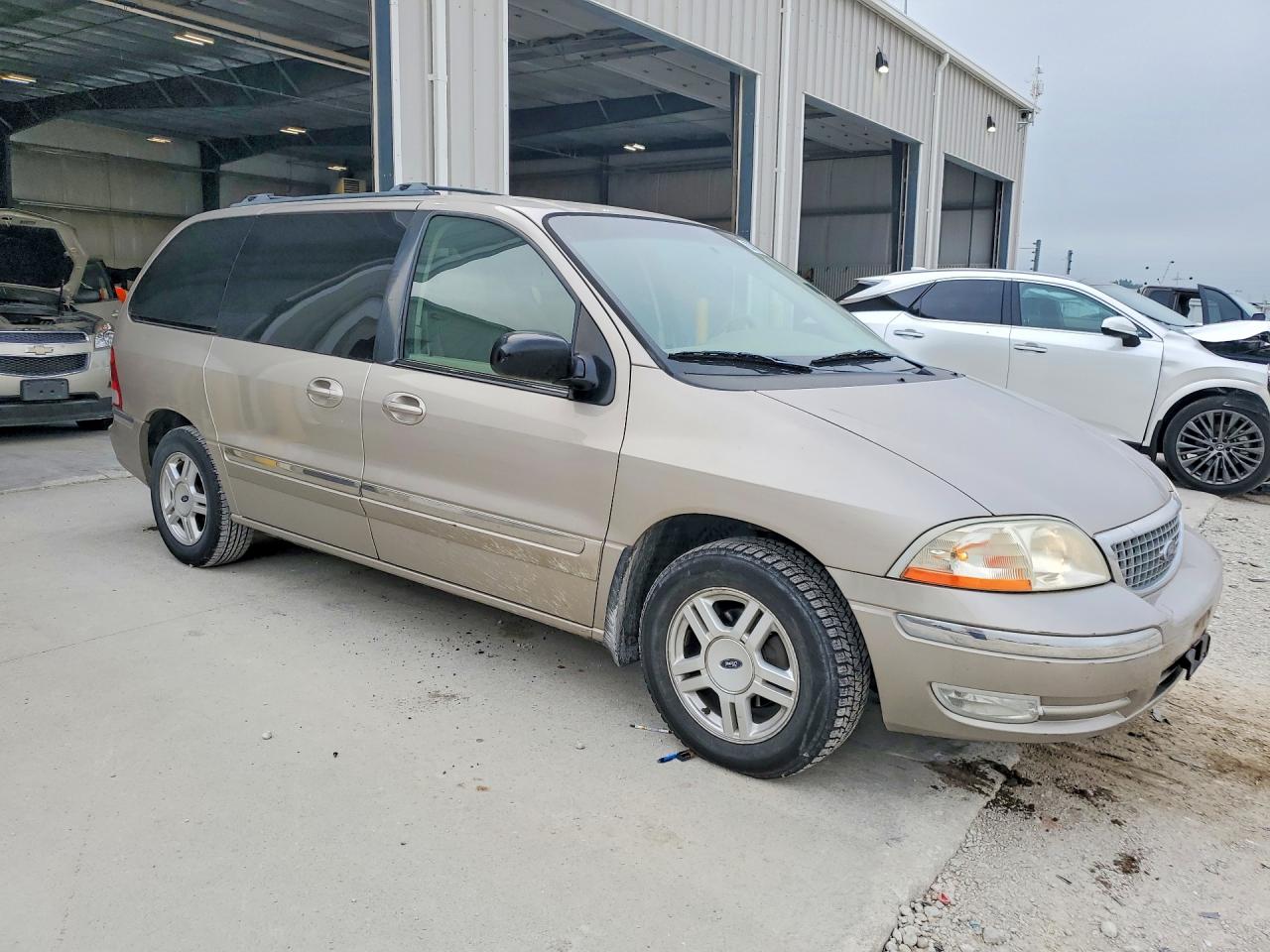 2FMZA524X2BB34318 · 2002 FORD WINDSTAR · 4/13