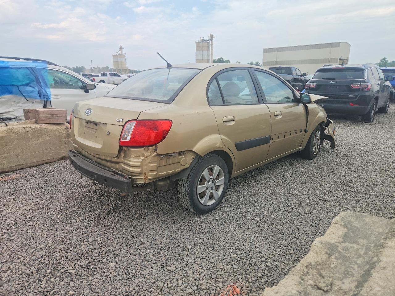 KNADE123266111751 · 2006 KIA RIO · 3/12