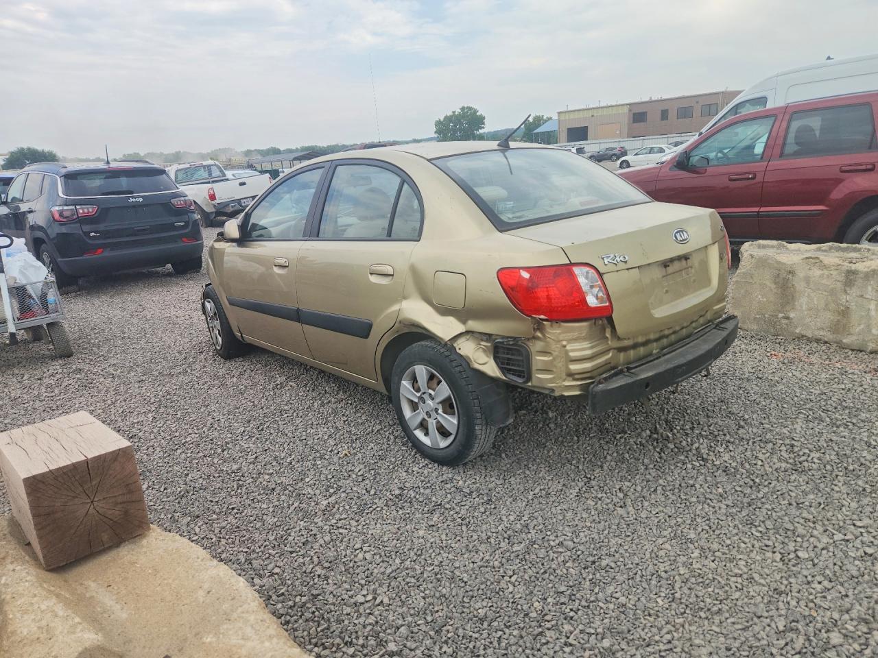 KNADE123266111751 · 2006 KIA RIO · 2/12