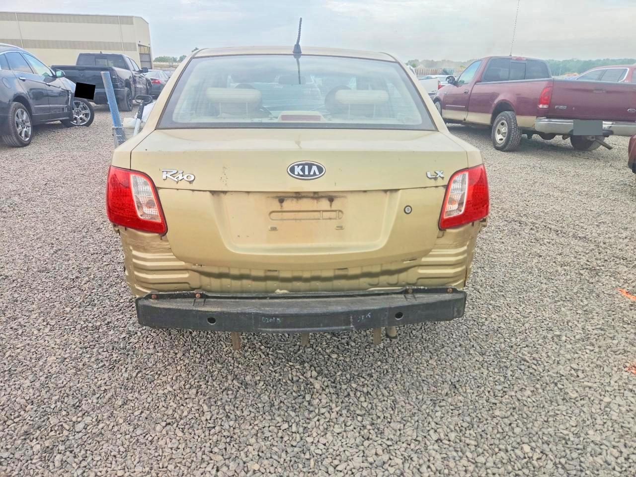 KNADE123266111751 · 2006 KIA RIO · 6/12