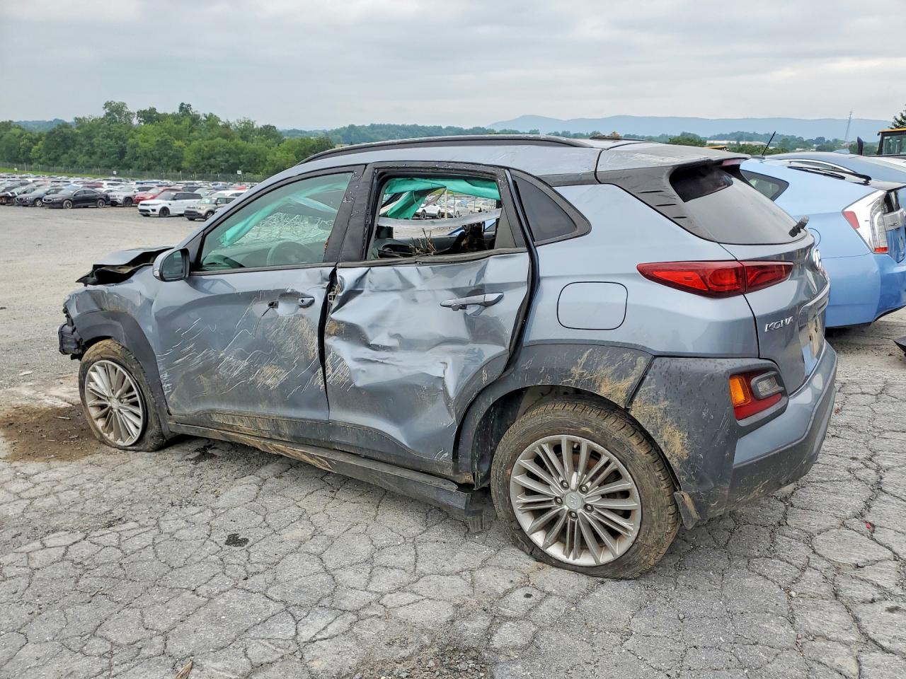 KM8K2CAA2JU112817 · 2018 HYUNDAI KONA · 2/13