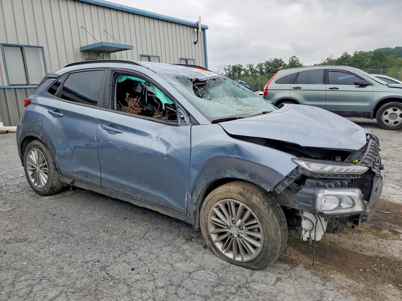 KM8K2CAA2JU112817 · 2018 HYUNDAI KONA · 4/13