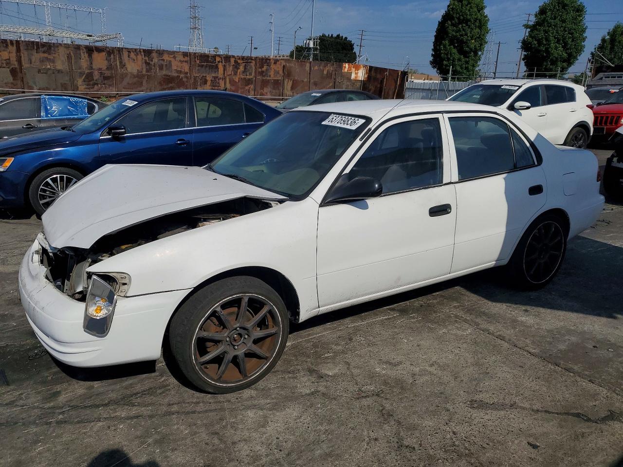 1NXBR12E4WZ057327 · 1998 TOYOTA COROLLA