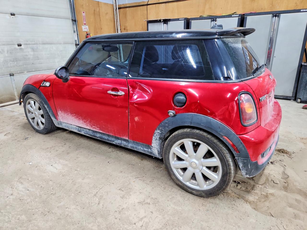 WMWMF73539TV39740 · 2009 MINI COOPER · 2/12