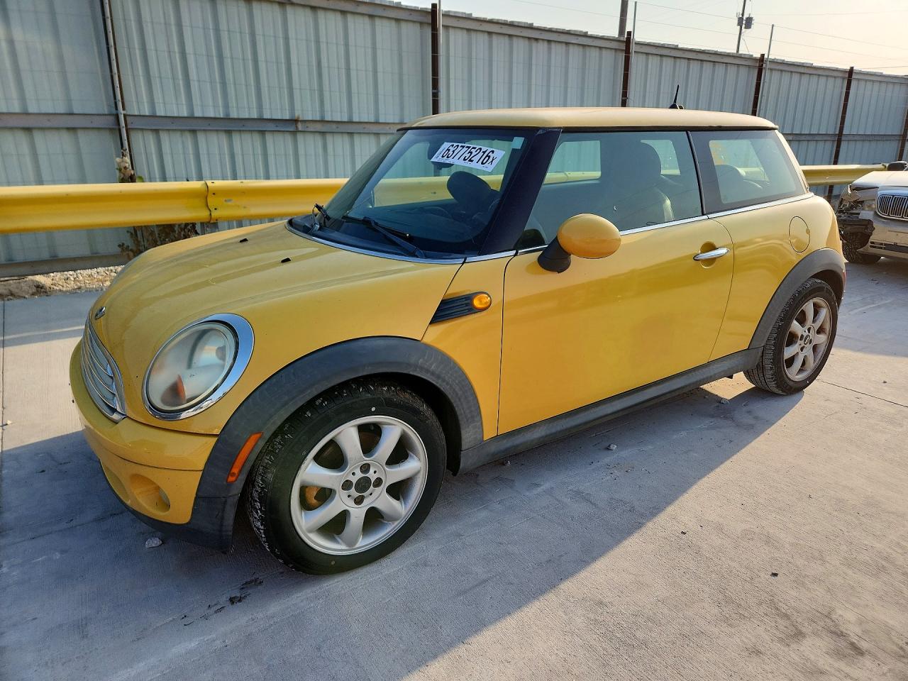 WMWMF33509TU70997 · 2009 MINI COOPER