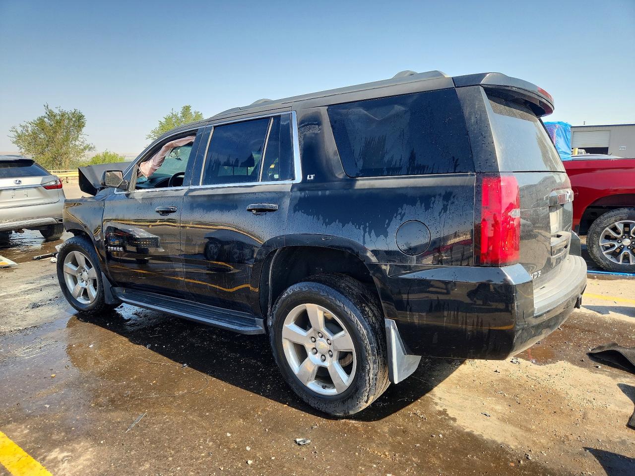 1GNSKBKCXFR644560 · 2015 CHEVROLET TAHOE · 2/14